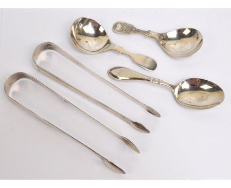 A pair of George III hallmarked silver sugar tongs with bright cut decoration and monogram, George Wintle, London 1796, a fur