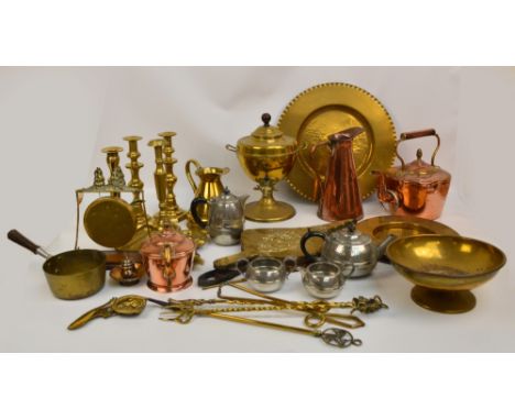 A large mixed lot of metalware including brass oil lamp, tea urn, various brass plates, gong, companion set, candlestick, jus