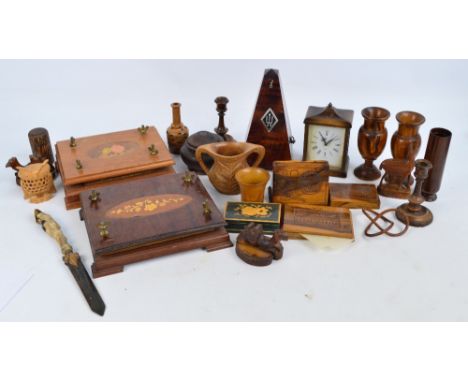 A quantity of treen including olive wood cigarette dispenser, candlestick, etc, also a metronome, two flower presses, and a p