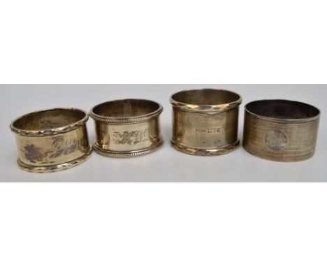 An Edward VII hallmarked silver napkin ring with flattened edges, S. Blanckensee & Sons, Chester 1910, a George V hallmarked 