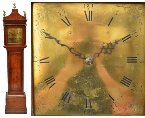 An 18th century oak thirty hour longcase clock, the shaped hood above fret carved frieze and 11" brass dial inscribed "Saml O