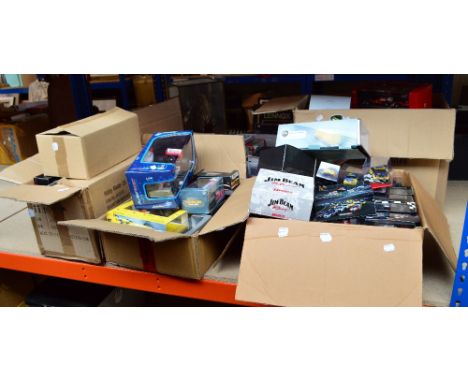 A very large collection of various toy diecast racing vehicles to include predominantly Mini Champs, Scuderia Ferrari Hot Whe