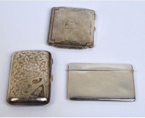 An Edwardian hallmarked silver and leaf engraved cigarette case of rounded rectangular form, the cover inscribed "A.Dimmock 1