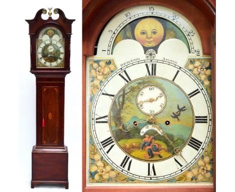 An early 19th century mahogany and inlaid eight day longcase clock, the hood with broken swan neck pediment above repainted a