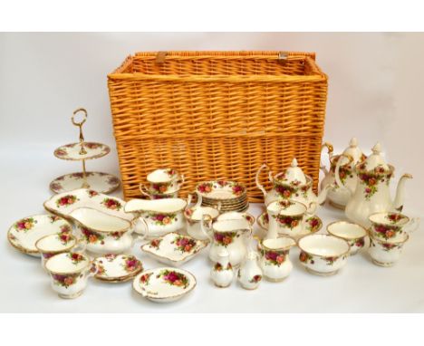 A Royal Albert "Old Country Roses" pattern decorated tea and dinner ware comprising six trios, two spare cups and saucers, on