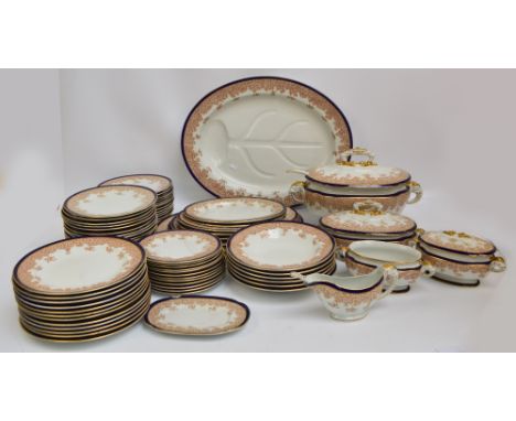 A large quantity of Royal Worcester floral transfer decorated and gilt heightened dinner ware, registered no. 68547, comprisi