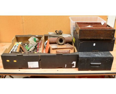 A quantity of tools including chisels, axe, and two bundles of gardening tools including spades, forks, rakes and hoes etc.