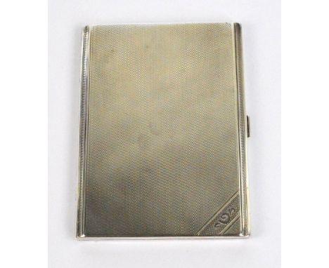 A George V hallmarked silver cigarette case of rectangular form with engine turned decoration, Birmingham 1933, 11.5 x 8.5cm,