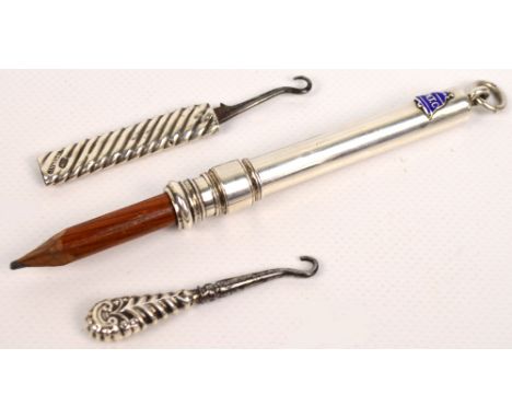 A George V hallmarked silver propelling pencil with an applied enamel decorated bell shaped National Telephone Co symbol, wit