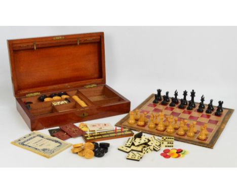 An early 20th century mahogany cased "Club" games compendium by FH Ayres Ltd of London comprising a leather lined chess/backg