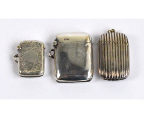 A Victorian hallmarked silver vesta case of rounded rectangular form with overall fluted body, WF Casewell, Birmingham 1895, 