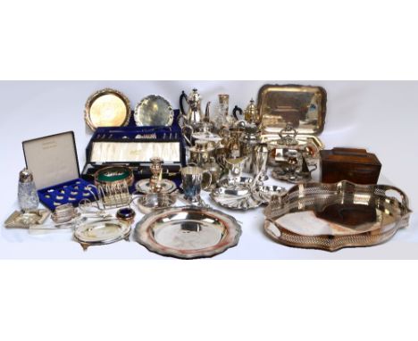 A large quantity of silver plate including a Victorian nautilus shell spoon warmer, shaped oval tray, tea canister, tea pots,