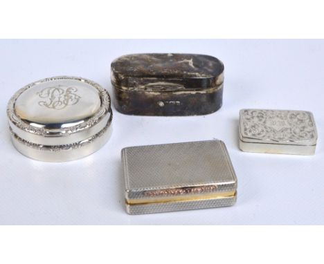 A George V hallmarked silver snuff box of rounded rectangular form with engine turned decoration, scrolling thumbpiece and th