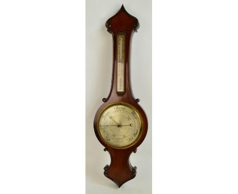 A 19th century mahogany onion topped wheel barometer with circular silvered main dial, length 85cm.