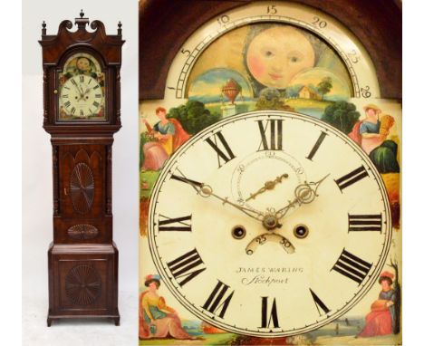 An early 19th century mahogany eight day longcase clock, the hood with broken swan neck pediment above arched painted dial in