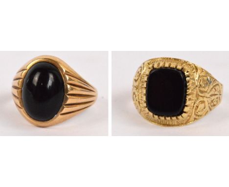 A gentleman's 9ct yellow gold and polished onyx cabochon signet ring, and a further similar 9ct example with engraved detail 