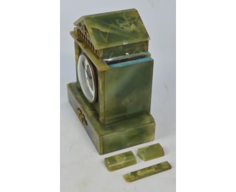 A c.1900 green onyx and gilt metal mounted mantel clock with enamel chapter ring set with Arabic numerals and with Jules Role