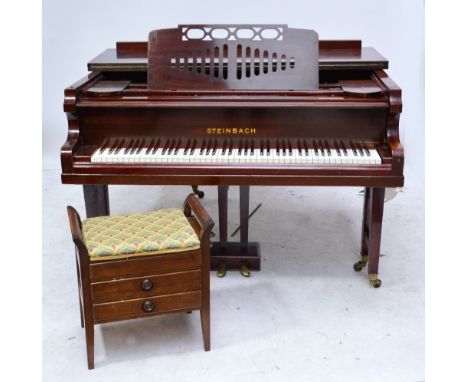 A 5ft mahogany Steinbach grand piano by "The Tughan Piano Company, Belfast", with square legs to castors, split sound board, 