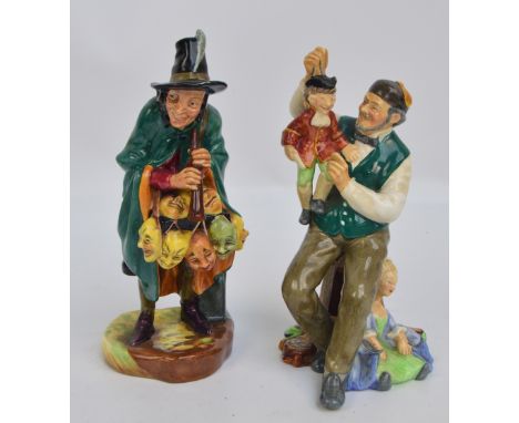 Two Royal Doulton figures; HN2103 "The Mask Seller", and HN2253 "The Puppet Maker". CONDITION REPORT: Appears good with no ob