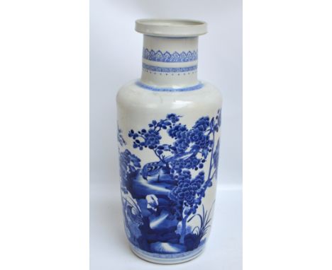 A decorative Chinese blue and white decorated cylindrical vase, height 46cm. CONDITION REPORT: Large flaw to neck. Dirty and 