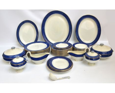 A quantity of Wedgwood dinnerware in a blue and white diamond pattern with gilt rim comprising ten dinner plates, twelve dess