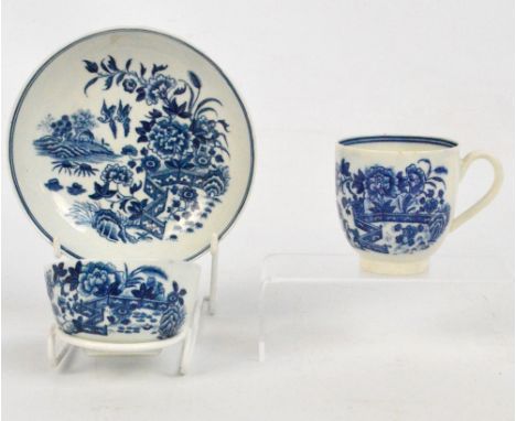 An 18th century Worcester transfer decorated trio, comprising tea bowl, saucer and coffee can, each piece decorated with flor