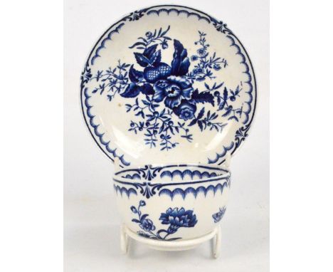 A mid 18th century English floral and butterfly decorated tea bowl and saucer, previously attributed to Worcester c.1755, bot