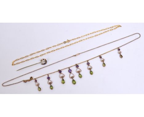 A 9ct yellow gold marine link necklace, length 40cm, a yellow metal horseshoe stick pin set with half seed pearls and blue st