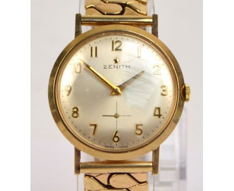 ZENITH; a 1960s 9ct yellow gold cased manual wind gentleman's wristwatch, the circular silvered dial set with Arabic numerals