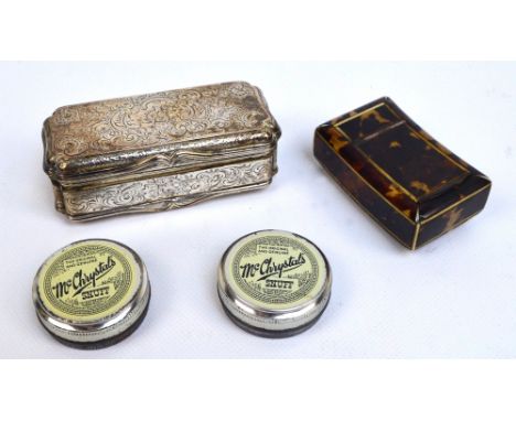 A small Victorian hallmarked silver table snuff box of rounded rectangular form with reentrant corners, floral scrolling deco