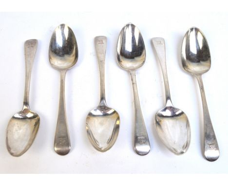 A set of six Victorian hallmarked silver Old English pattern dessert spoons, the finials crested with the head of an elephant