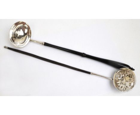 A George II hallmarked silver toddy ladle with plain oval bowl and turned ebonised wooden handle, possibly Robert Lucas, Lond