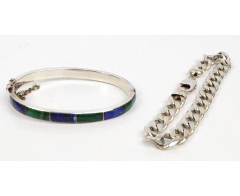 A 950 standard silver snap bangle set with malachite and lapis lazuli to the outer section, with safety chain, oval 6.5 x 5cm