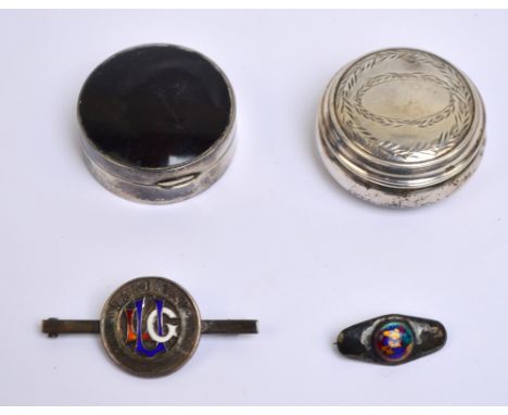 A George V hallmarked silver circular pill box with tortoiseshell set to the hinged lid, Walker & Hall, Birmingham 1927 and a