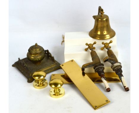 A small quantity of brass items comprising a vintage inkwell with ceramic liner, a small bell with wall fixing and rope, a pa