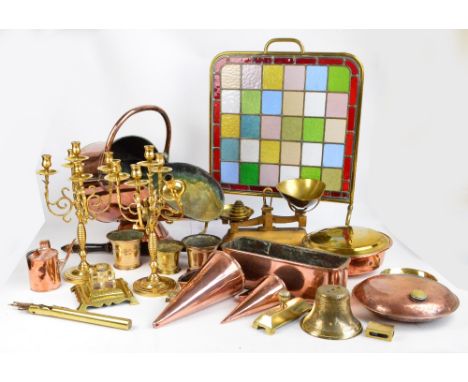 A quantity of metalware including a brass fire screen with stained leaded glass panel, a copper helmet coal scuttle, a warmin