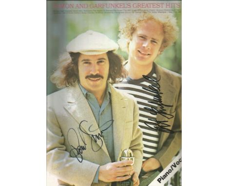Simon and Garfunkel signed piano music book. Lovely piano music book of Simon and Garfunkel's Greatest Hits autographed on th