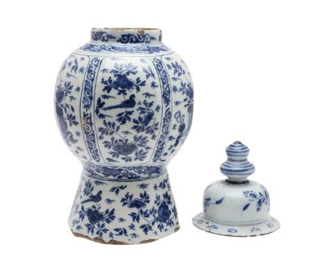 Probably 18thc, with an ovoid shaped body and octagonal shaped lower section, painted with vases of flowers, birds and flower