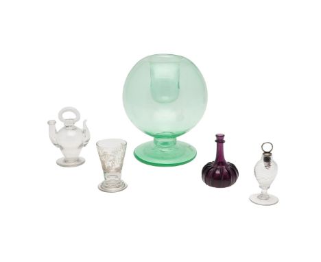 Including a German hand blown engraved and gilded toasting glass, etched with a coronet, initials and a crest and with bubble
