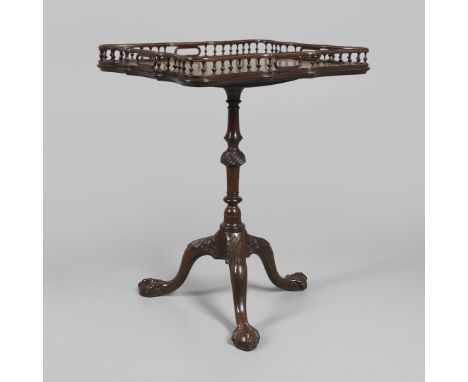 the rectangular galleried tilt top upon a slender ring turned column and tripod base, carved with  claw and ball feet, height
