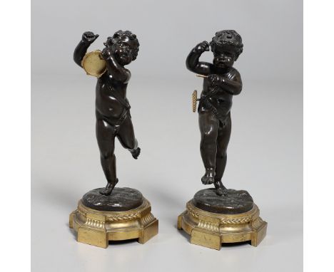 19th century, each modelled dancing, playing a tambourine and pan pipes, the gilt metal bases cast with Classical wreath and 