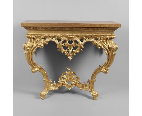 the solid wood top over an ornate frieze with central C scroll crest, on foliate decorated cabriole legs, height 90cm, width 