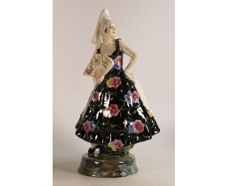 Goldscheider Austrian figure of a Spanish Flamenco dancer holding a fan, floral dress with cream shawl, h.36cm. 