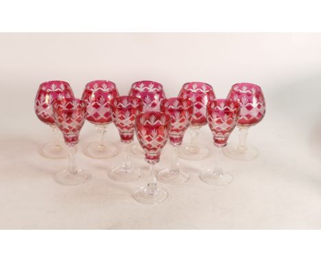A set of 10 Cranberry red glasses to include five Cognac glasses together with five Port glasses. (10) 