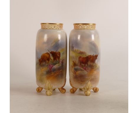 A pair of Royal Worcester Highland cattle vases,  cylindrical form with pierced rim on 4 feet, signed by Harry Stinton. Marke