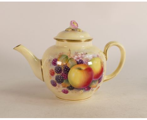 Royal Worcester Ivory porcelain tea pot. Painted with fruit still life by R. Platt. Modelled with a figural flower handle to 