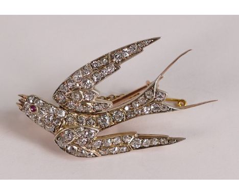 Yellow &amp; white metal flying Bird brooch, quality item set with 71 various size diamonds and a ruby birds eye, 5 x 3cm, 11