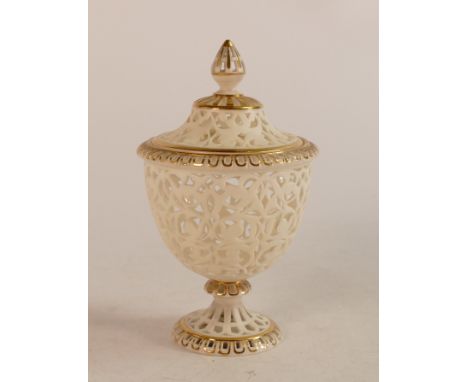 Exceptional Worcester quality porcelain reticulated vase and cover, marked England.  13cm high. 