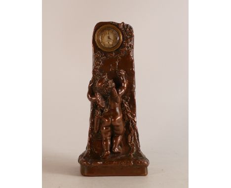 Gustave Van Vaerenbergh (Belgian, 1873-1927) Art Nouveau Bronze Mantle clock, decorated with cupid doing graffiti, signed to 