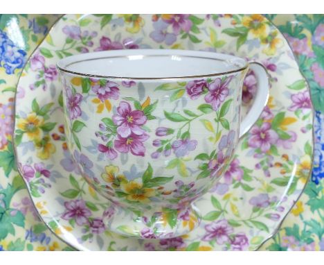 Royal Winton Chintz tea ware to include tea pot, milk jug, toast rack and tea trio in the Estelle pattern. A beaker, jam pot 